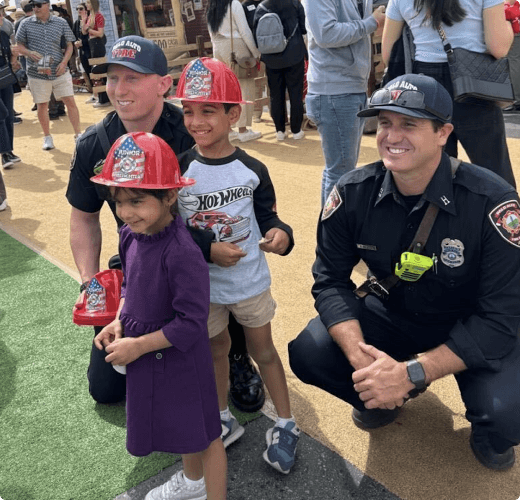 kids wearing firefighter cap